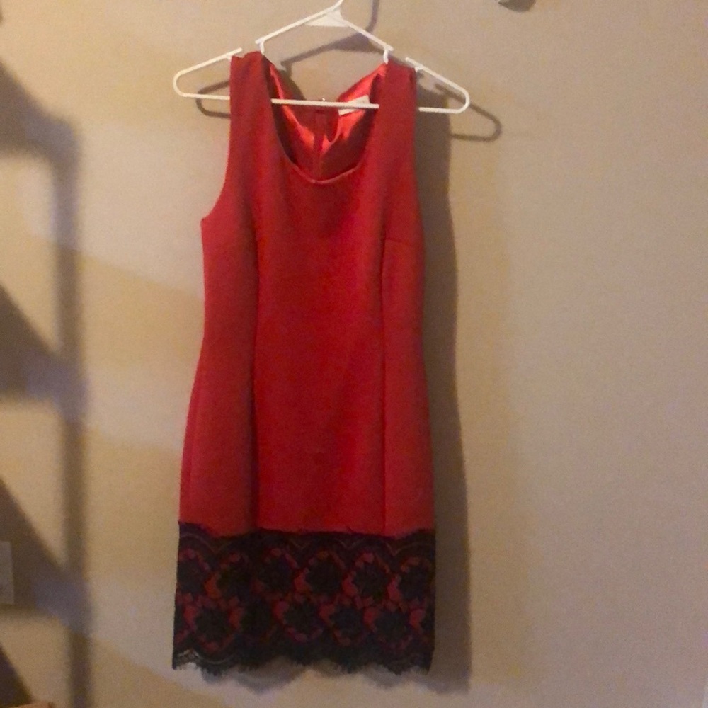 Red formal dress with black lace design